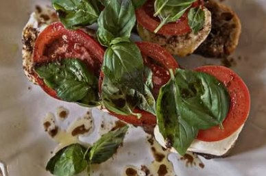 Caprese toast on sourdough with tomato, basil, and balsamic