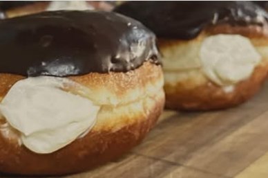 Boston cream donuts with chocolate glaze and a generous cream filling